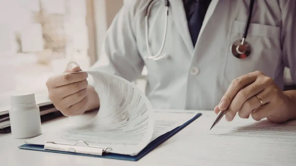 Doctor reviewing treatment plan for medications for alcohol withdrawal