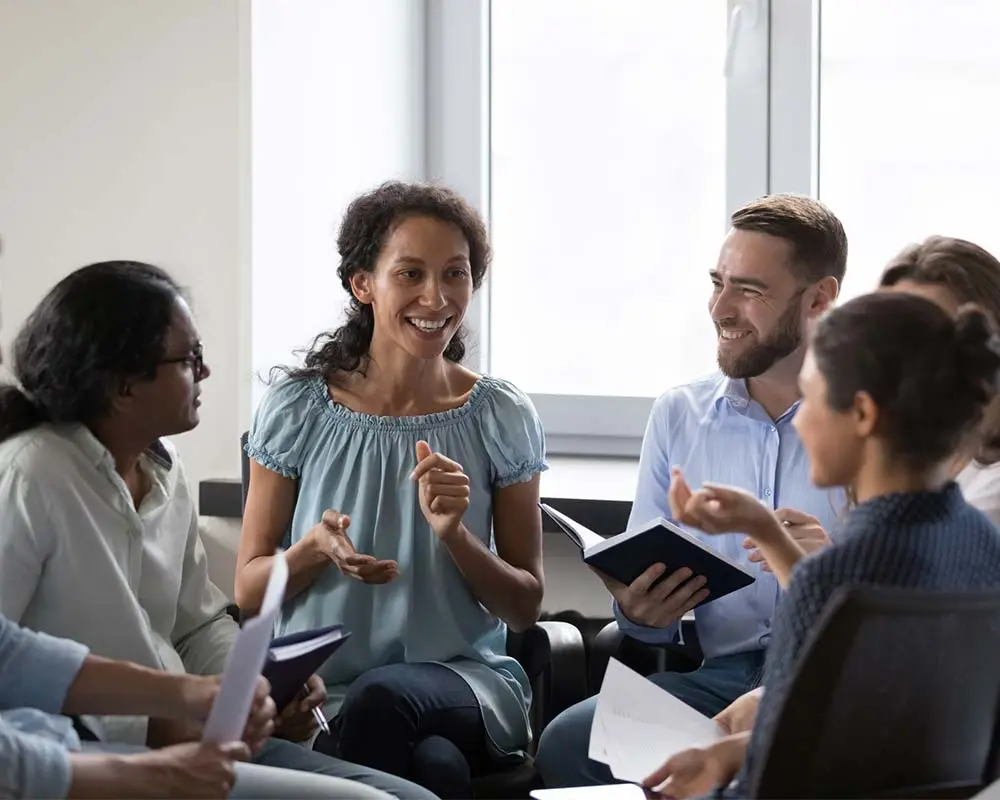 Happy-Group-Smiling-Guy-and-Girl Outpatient Addiction Treatment And Alcohol Treatment