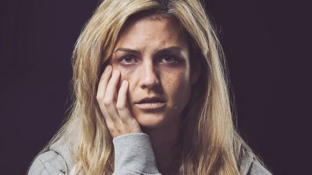 a woman dealing with individual factors affecting her opioid addiction