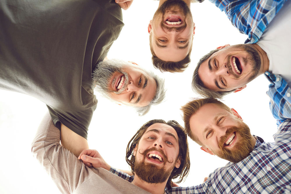Participants in a 12-step group recovery session