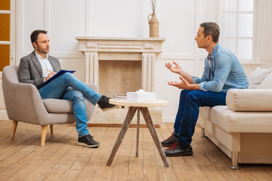 man receiving addiction treatment through PHP