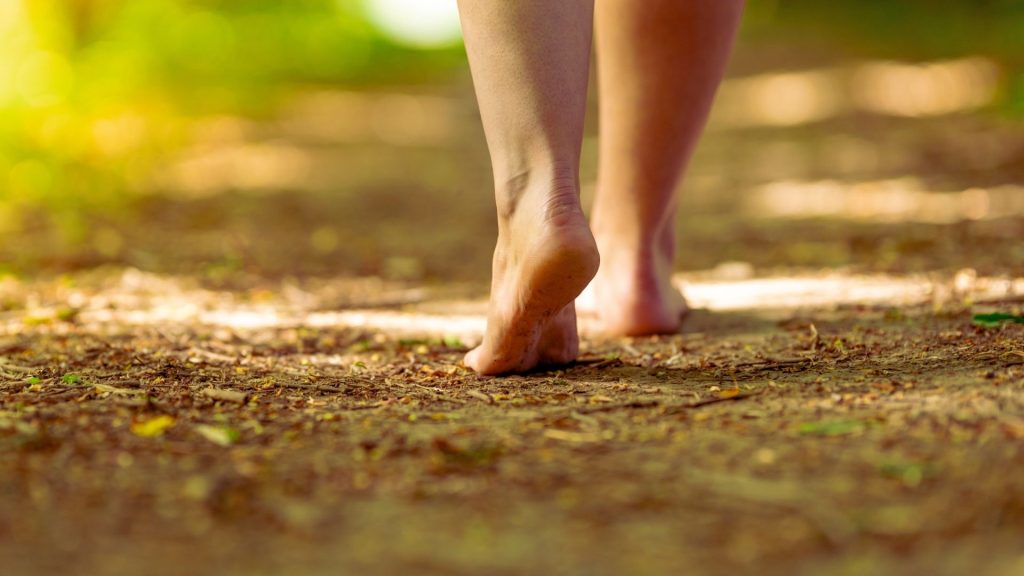 Person walking along a path as a grounding strategy during heroin cravings