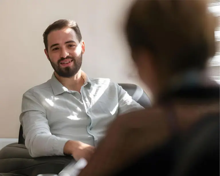 therapist discussing xylazine addiction symptoms and recovery signs