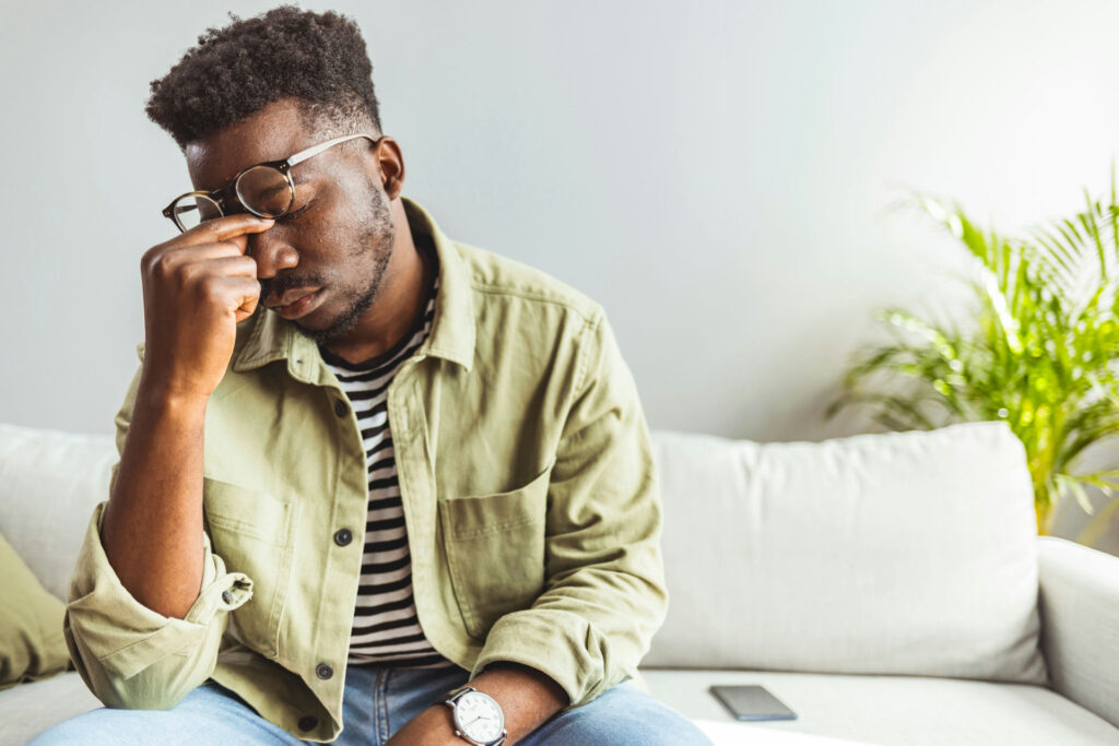 Person feeling restless and bored in early addiction recovery